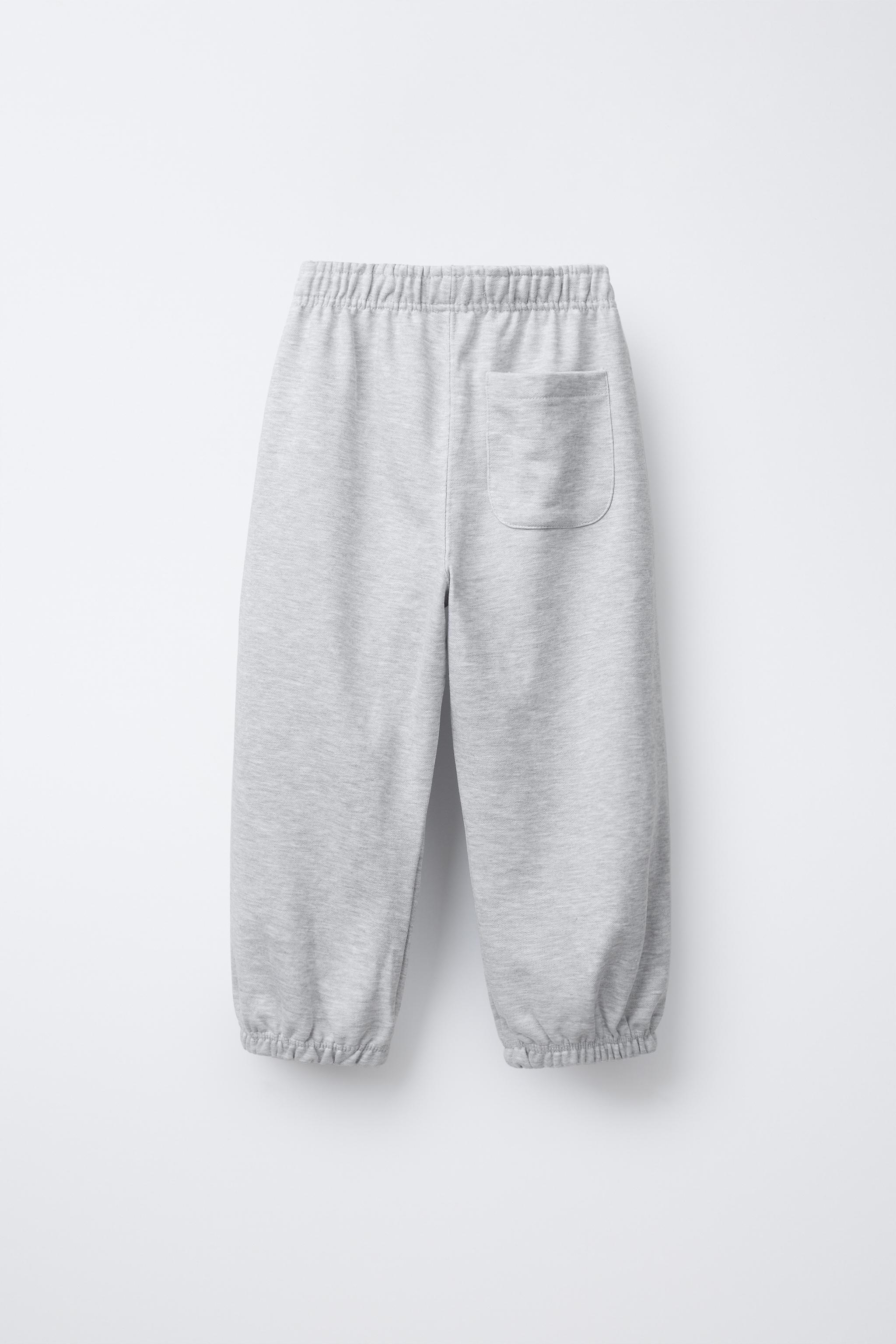 PANTALON DE JOGGING EN MOLLETON STOPPEURS